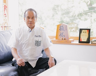 代表/尾崎 勝